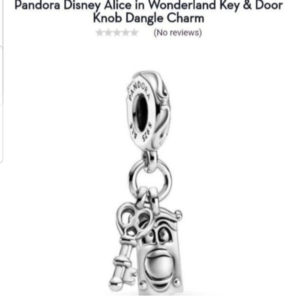 Last one Disney Alice in Wonderland key and doorknob sterli